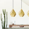 Dining room with three pendant lights and plants