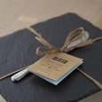 Close up of a slate square cheeseboard set