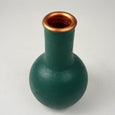 Teal cylinder vase with copper accents
