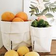 Fruit in medium washable paper sacs 